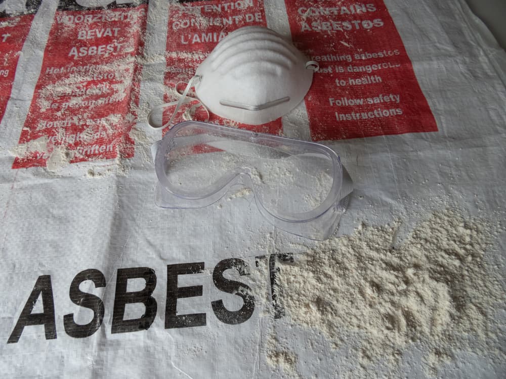 Asbestos waste bag with asbestos mask and goggles