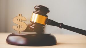 Judge hammer with the dollar placed