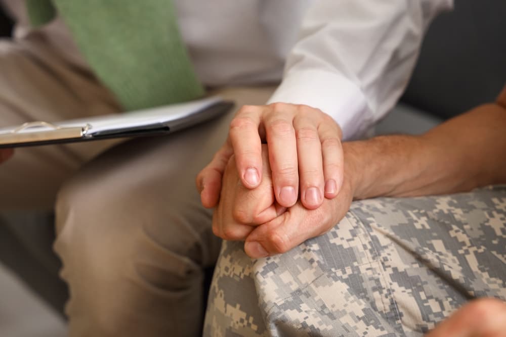 Mesothelioma attorney working with a veteran